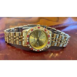 Women's Gold Tone Capezio Watch with Clear ad Red Crystal Accented Bezel